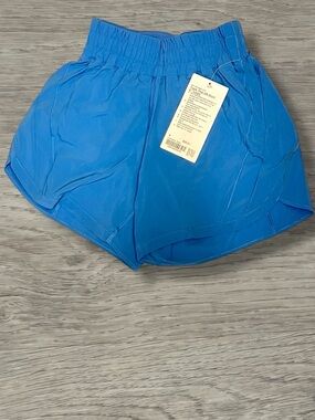 Lululemon Track That Short 5” lined running shorts in Pool Party blue.